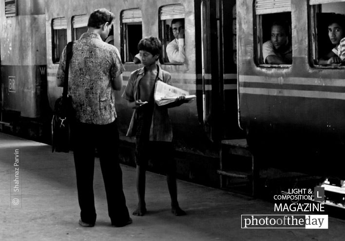 The Paperboy, by Shahnaz Parvin The Paperboy, by Shahnaz Parvin - Documentary Photography, Photojournalism, Photo of the Day, Photography Awards,  Street Photography
