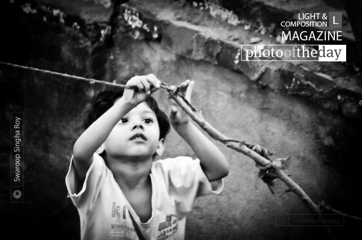 Invisible Ties Kid Ties a Knot, by Swaroop Singha Roy - Candid Photography, Photojournalism, Child Photography, Street Photography, Award Winning Photo