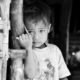 Shy Little Boy by Chhun Borin - Photojournalism, Portrait Photography, Award-Winning Photography, Photography Education, Light & Composition University