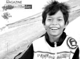 Happy Peanut Boy by Chhun Borin - Photojournalism, Portrait Photography, Street Photography, Award Winning Photo, Photo of the Day