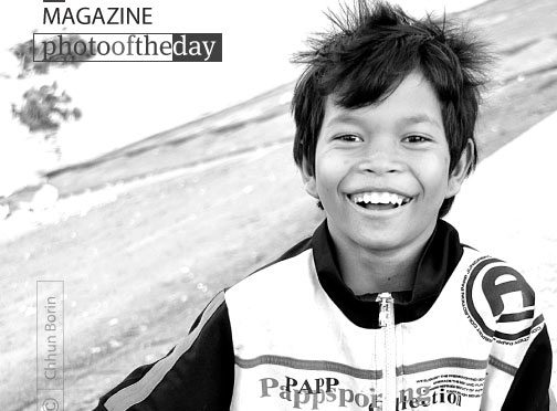 Happy Peanut Boy by Chhun Borin Happy Peanut Boy by Chhun Borin - Photojournalism, Portrait Photography, Street Photography, Award Winning Photo, Photo of the Day