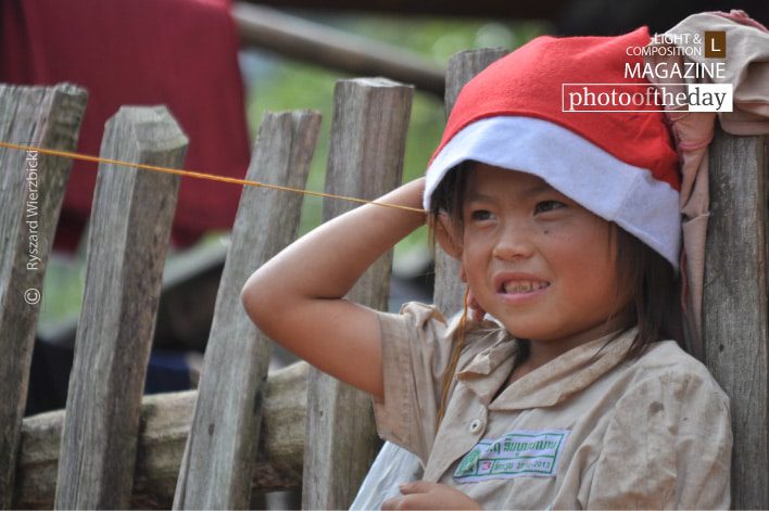 Jumping Rope Girl, by Ryszard Wierzbicki Jumping Rope Girl, by Ryszard Wierzbicki - Candid Photography, Photojournalism, Photography Award,  Award Winning Photo, Laos