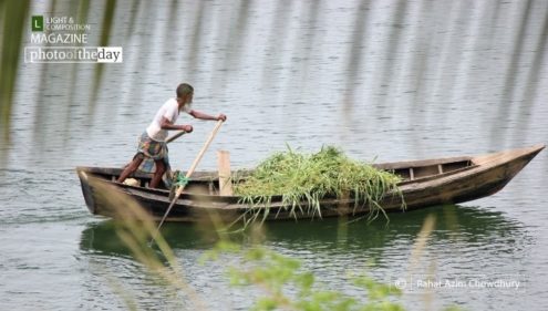 The Boatman, by Rahat Azim Chowdhury - Documentary Photography, Photojournalism, Photography Awards, Art Photography, Online Photography Courses
