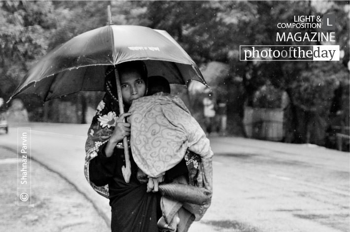 The Mother and the Rain, by Shahnaz Parvin The Mother and the Rain, by Shahnaz Parvin - Documentary Photography, Photojournalism, Award Winning Photography, Photo of the Day,  Art Photography