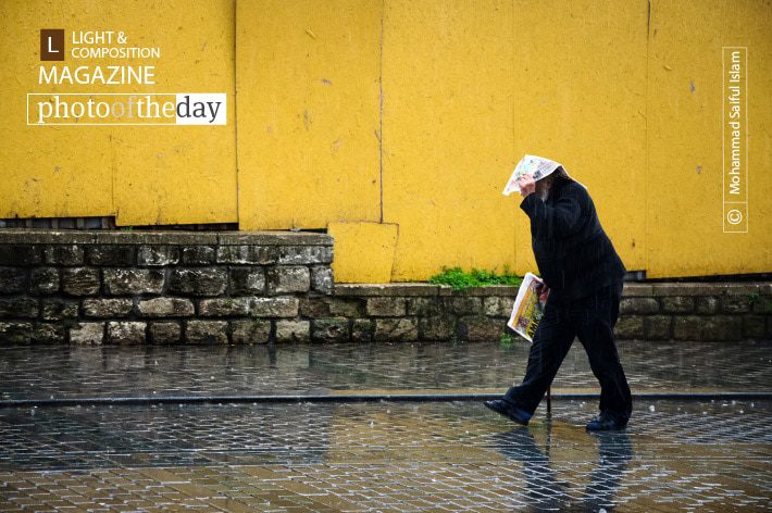 Rhythm in the Rain, by Mohammad Saiful Islam Rhythm in the Rain, by Mohammad Saiful Islam - Street Photography, Photojournalism, Photography Awards, Photo of the Day, Online Photography Courses