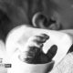 A Little Hand Pure, by Zoe Ladika - Photojournalism, Photography Awards, Black and White Photography, Newborn Photography, Photo of the Day