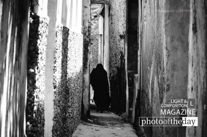 Across the Alley, by Mohammad Saiful Islam Across the Alley, by Mohammad Saiful Islam - Photojournalism, Black and White Photography, Documentary Photography, Photography Awards, Online Photography Courses