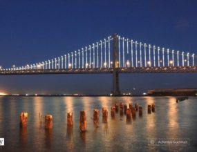 Illuminated Bay Bridge by Achintya Guchhait