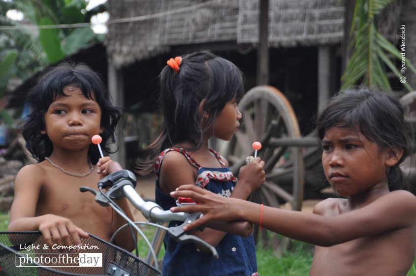 Lollipop Girls, by Ryszard Wierzbicki Lollipop Girls, by Ryszard Wierzbicki - Candid Photography, Photojournalism, Photography Awards, Award Winning Photo, Children Photography