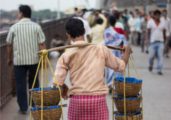 The Fish Peddler, by Sandeep Nair - Photojournalism, Documentary Photography, Street Photography, Award-Winning Photography, Kolkata