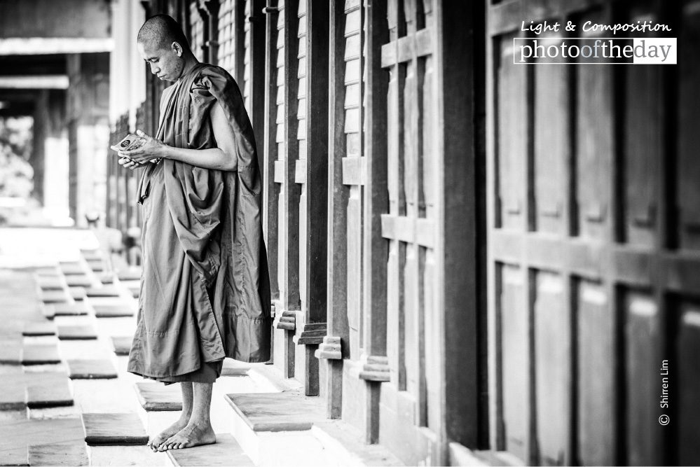 Tourist Monk, by Shirren Lim Tourist Monk, by Shirren Lim - Candid Photography, Art Photography, Photojournalism, Photo of the Day, Shirren Lim