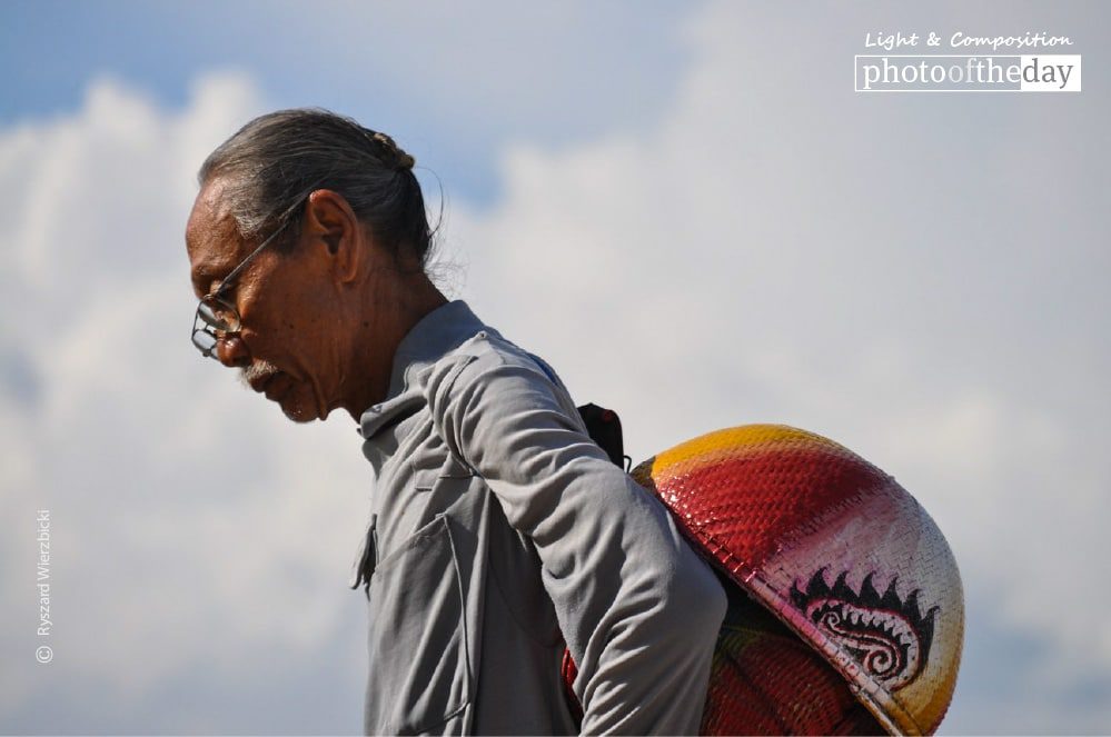 A Fisherman with His Colored Hat, by Ryszard Wierzbicki - Photojournalism, Award-Winning Photography, Candid Photography, Bali, Ryszard Wierzbicki