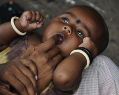 A Street Baby, by Ryszard Wierzbicki - Photojournalism, Street Photography, Documentary Photography, Ryszard Wierzbicki, Photography Awards