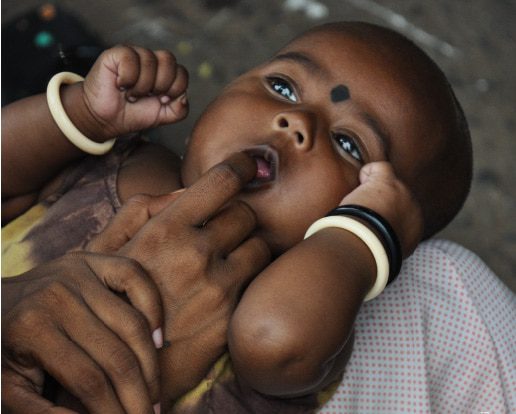A Street Baby, by Ryszard Wierzbicki A Street Baby, by Ryszard Wierzbicki - Photojournalism, Street Photography, Documentary Photography, Ryszard Wierzbicki, Photography Awards