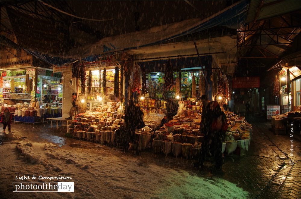 Snowing in Diyarbakir Bazaar, by Mehmet Masum - Photojournalism, Night Photography, Documentary Photography, Photography Awards, Mehmet Masum Suer