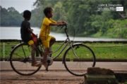Angkor Cyclists, by Ryszard Wierzbicki - Travel Photography, Award Winning Photo, Angkor Wat, Cambodia, Ryszard Wierzbicki