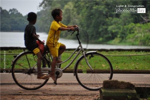 Angkor Cyclists, by Ryszard Wierzbicki - Travel Photography, Award Winning Photo, Angkor Wat, Cambodia, Ryszard Wierzbicki