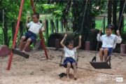 Boys on the Swings, by Ryszard Wierzbicki - Photojournalism, Travel Photography, Award-Winning Photography, Ryszard Wierzbicki, Photo of the Day