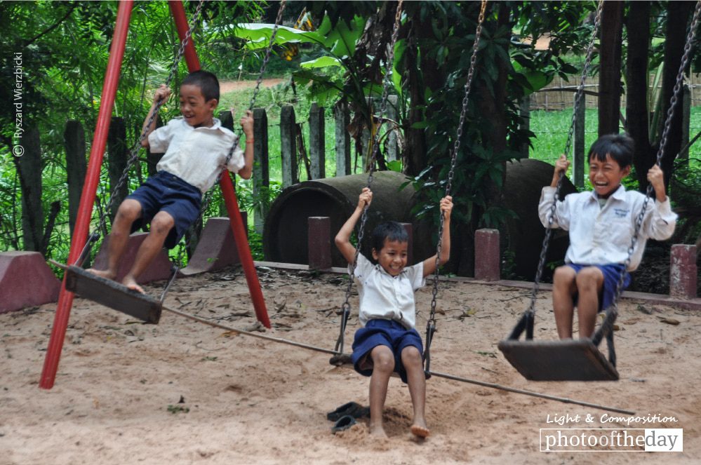Boys on the Swings, by Ryszard Wierzbicki Boys on the Swings, by Ryszard Wierzbicki - Photojournalism, Travel Photography, Award-Winning Photography, Ryszard Wierzbicki, Photo of the Day