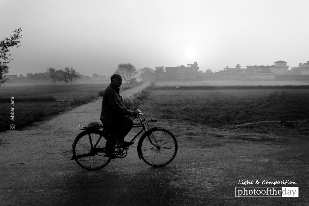 A Cyclist, by Jabbar Jamil - Street Photography, Photo of the Day, Black and White Photography, Award Winning Photography, Jabbar Jamil
