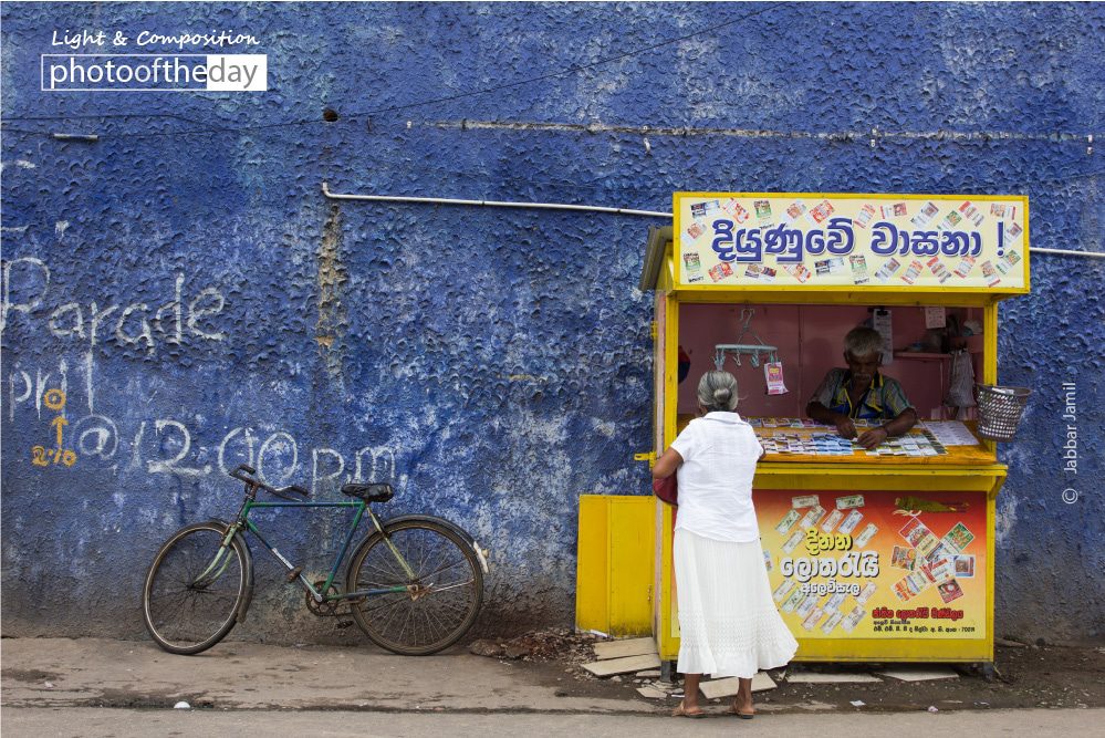 A Lottery Stall, by Jabbar Jamil A Lottery Stall, by Jabbar Jamil - Street Photography, Color Photography, Photo of the Day, Photography Awards, Jabbar Jamil