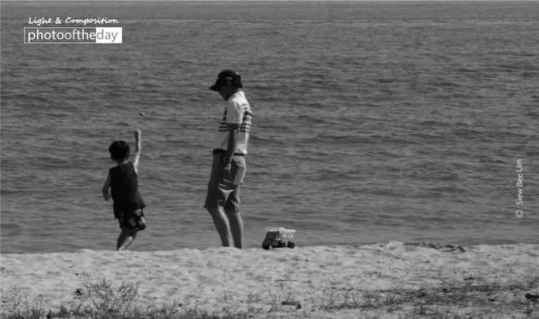 Throwing a Stone, by Siew Bee Lim - Photo of the Day, Black and White Photography, Photojournalism, Photography Awards, Siew Bee Lim