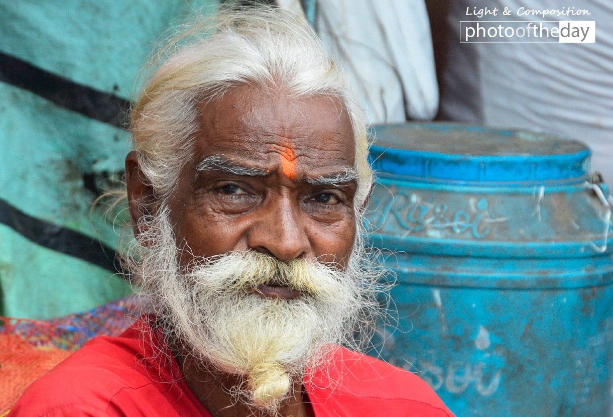 A Market Vendor in Kolkata, by Claudio Bacinello - Portrait Photography, Photojournalism, Photography Awards, Photo of the Day, Online Photography Courses