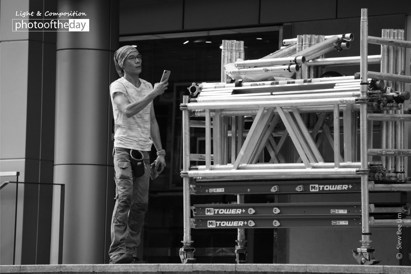 Heavy, by Siew Bee Lim Heavy, by Siew Bee Lim - Street Photography, Photojournalism, Photography Awards, Photo of the Day, Siew Bee Lim