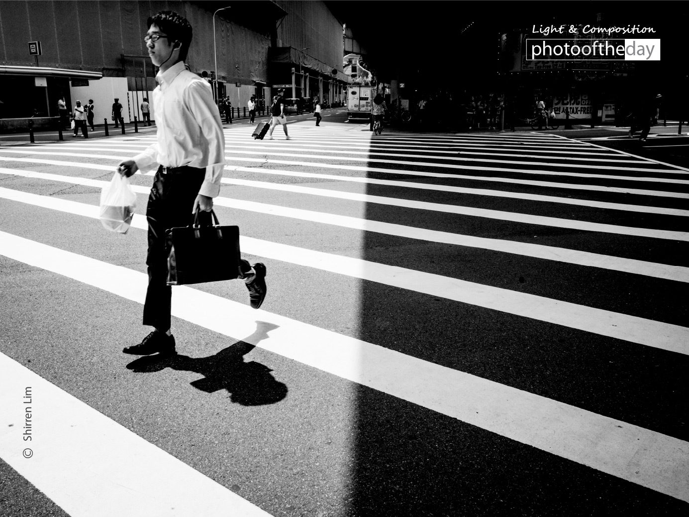 Light and Darkness, by Shirren Lim Light and Darkness, by Shirren Lim - Street Photography, Photojournalism, Photography Awards, Award Winning Photography, Shirren Lim