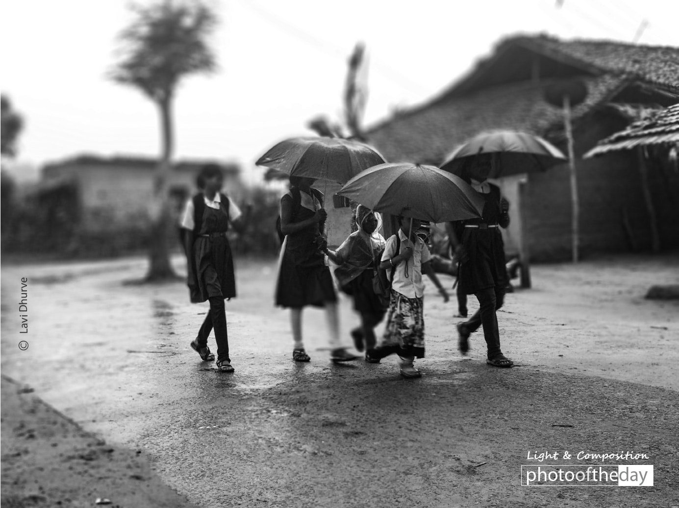 School Kids in the Rain by Lavi Dhurve School Kids in the Rain by Lavi Dhurve - Photojournalism, Black and White Photography, Documentary Photography, Award Winning Photography, Photography Education