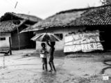 Photojournalism, Black and White Photography, Photography Awards, Photo of the Day, Lavi Dhurve – Fixing Umbrella, by Lavi Dhurve Fixing Umbrella, by Lavi Dhurve - Photojournalism, Black and White Photography, Photography Awards, Photo of the Day, Lavi Dhurve