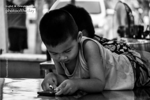 Mobile Player by Ryszard Wierzbicki - Photojournalism, Photo of the Day, Award Winning Photography, Black and White Photography, Ryszard Wierzbicki