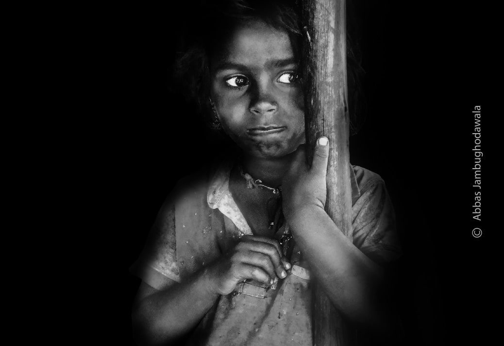 Shying to Camera by Abbas Jambughodawala - Photojournalism, Portrait Photography, Award-Winning Photography, Photography Awards, Light & Composition University