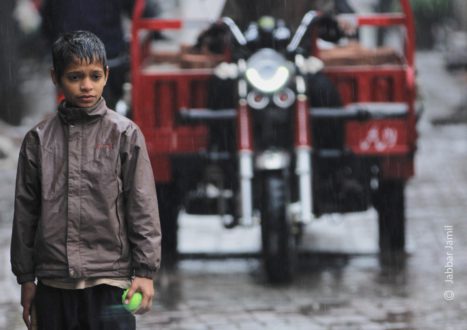 Rainy Cricket by Jabbar Jamil - Street Photography, Award Winning Photography, Photojournalism, Photography Awards, Light & Composition University