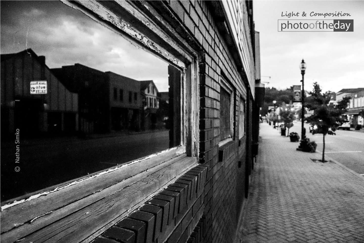 Railroad Reflection by Nathan Simko Railroad Reflection by Nathan Simko - Black and white photography, Photojournalism, Art Photography, Photo of the Day, Photography Awards