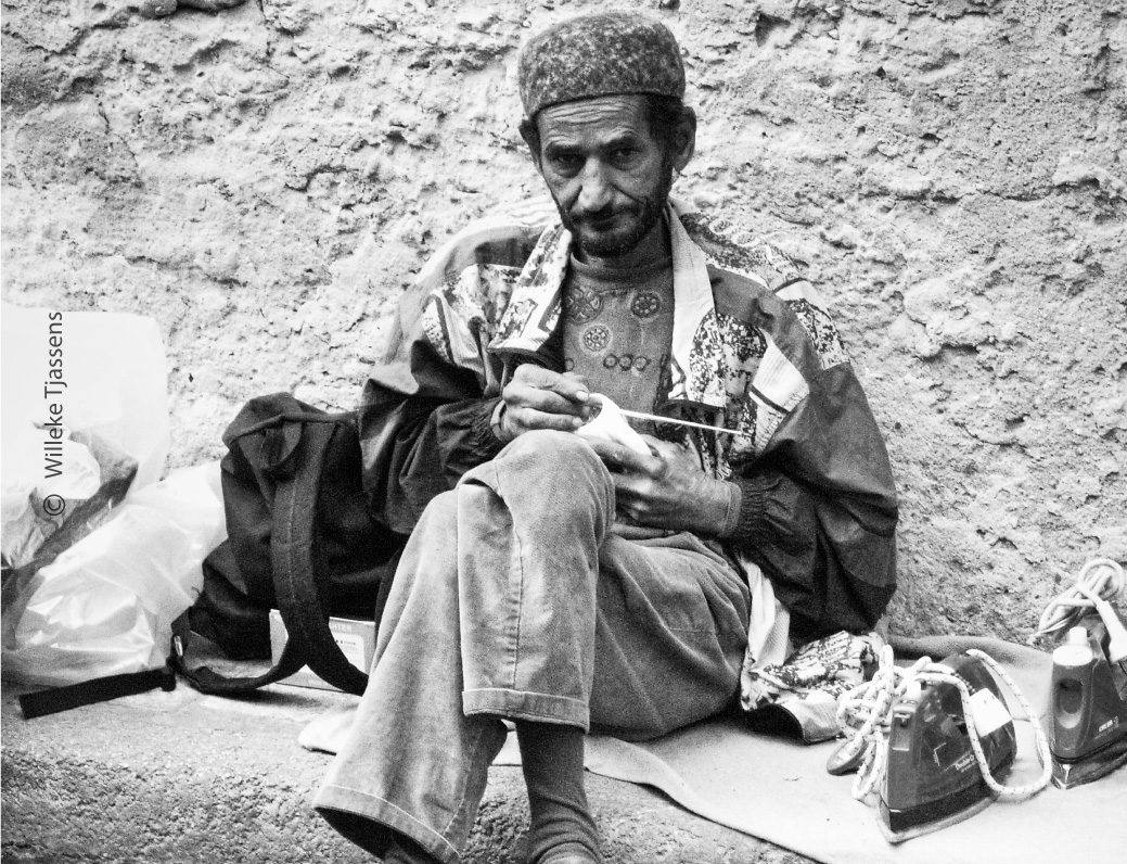 Selling Irons by Willeke Tjassens Selling Irons by Willeke Tjassens - Street Photography, Photojournalism, Award Winning Photography, Photography Awards, Willeke Tjassens