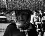 Woman with Straw Bag by Fidan Nazim Qizi - Photojournalism, Portrait Photography, Award Winning Photography, Photo of the Day, Light & Composition University