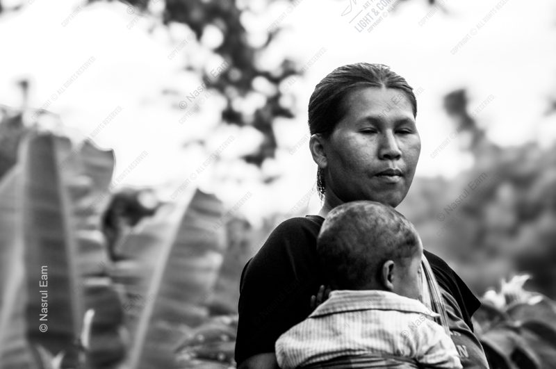 Woman Carrying Her Child Woman Carrying Her Child - Fine Art Photography Print, Limited Edition Print,  Motherhood Photography, Documentary Photography,  Portrait Photography