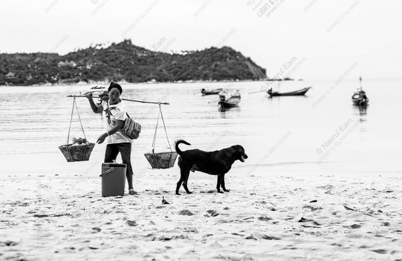 The Vendor and Her Companion on the Shoreline - Fine Art Photography Prints, Limited Edition Photography, Museum-Quality Photography,  High-End Photography Prints, Photography Art for Sale