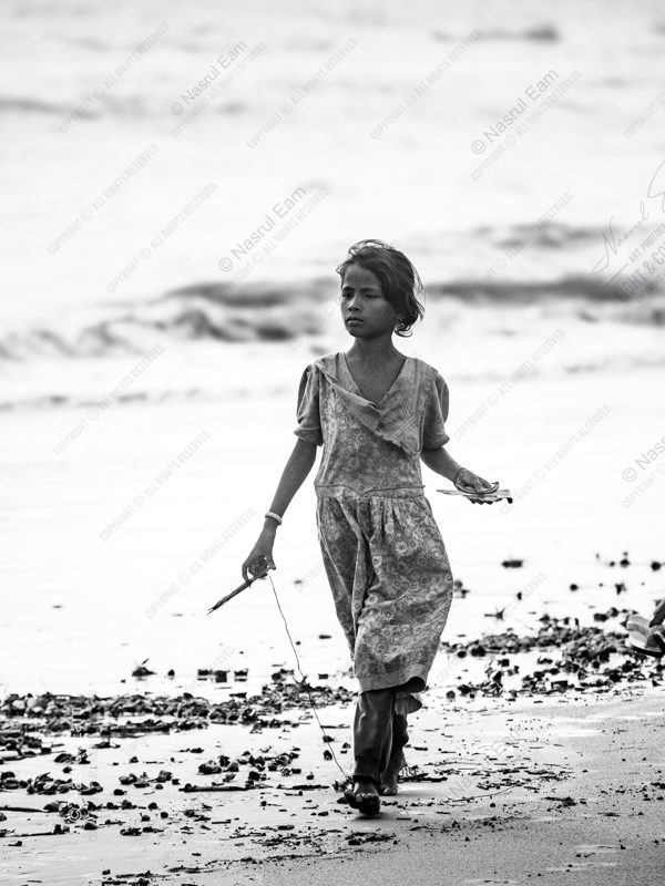 Pensive Steps on the Tidal Shore