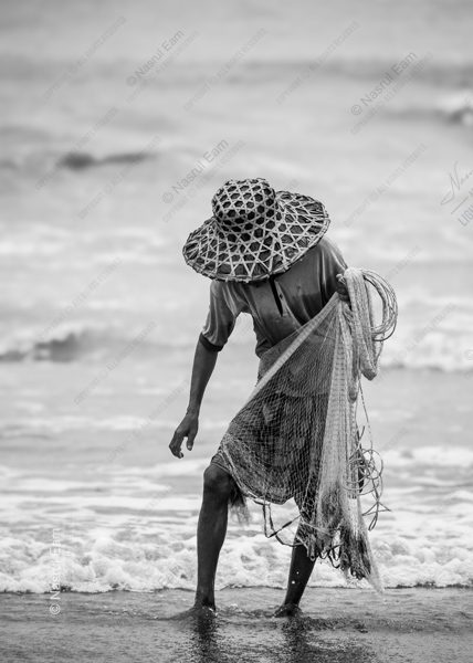 The Net Gatherer at the Water's Edge The Net Gatherer at the Water's Edge - Fine Art Photography Prints, Limited Edition Photography, Giclée Print, Museum-Quality Photography, Art Photography Investment