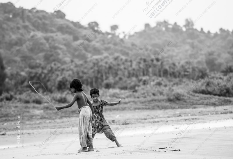 Two Children with a Reed on the Shore Two Children with a Reed on the Shore - Fine Art Photography Print, Limited Edition Print, Giclée Print, Monochrome Photography, Children Photography
