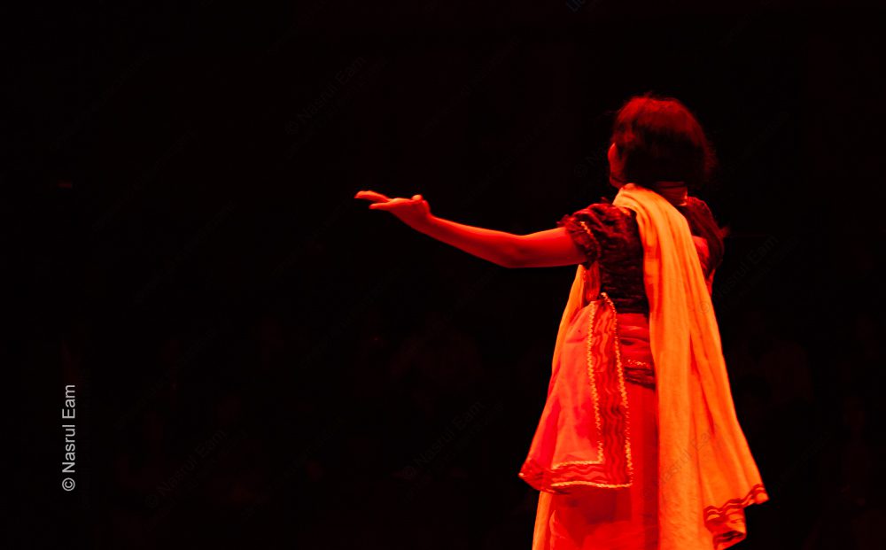 Gesture in Crimson and Shadow