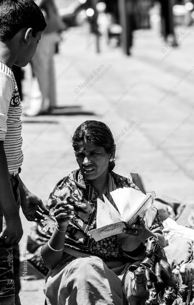 A Woman's Accounting on the Street - Fine Art Photography Print, Limited Edition Print, Monochrome Photography, Street Photography, Art Photography for Collectors