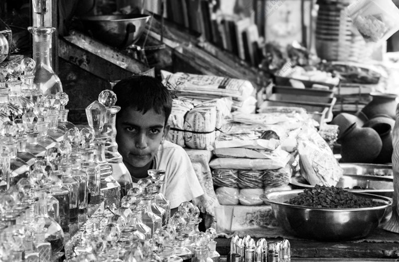 The Boy at the Crystal Bottle Stall - Fine Art Photography Print, Limited Edition Photography, Giclée Print, Black and White Photography,  Art Photography for Sale