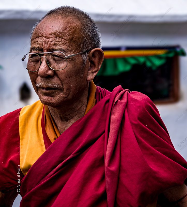 Elderly Monk in Crimson Robes