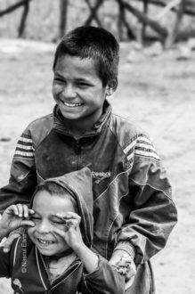 Two Boys Sharing a Joyful Moment