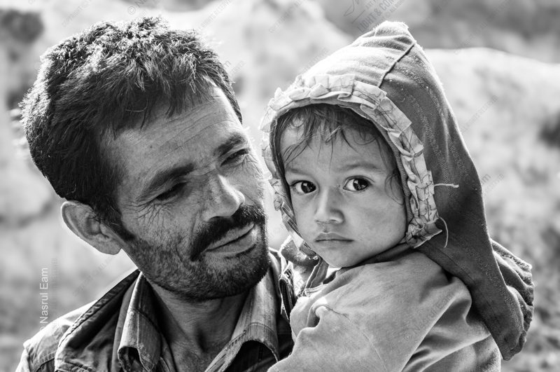 A Father's Embrace, A Child's Gaze A Father's Embrace, A Child's Gaze - Fine Art Photography Prints, Limited Edition Photography, Giclée Prints,  High-End Photography Art, Collector Photography