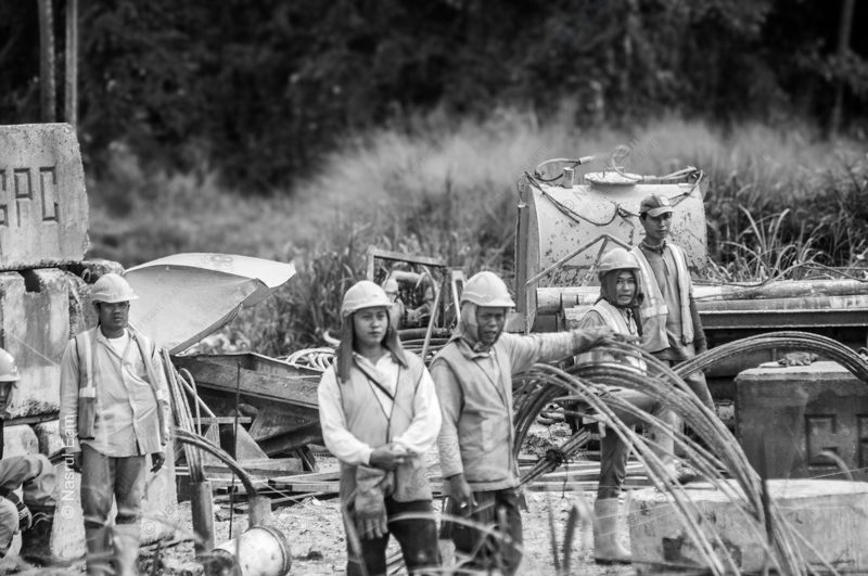 Workers Amidst Coiled Steel - Fine Art Photography Print, Limited Edition Photography, Documentary Photography, Black and White Photography, Industrial Photography