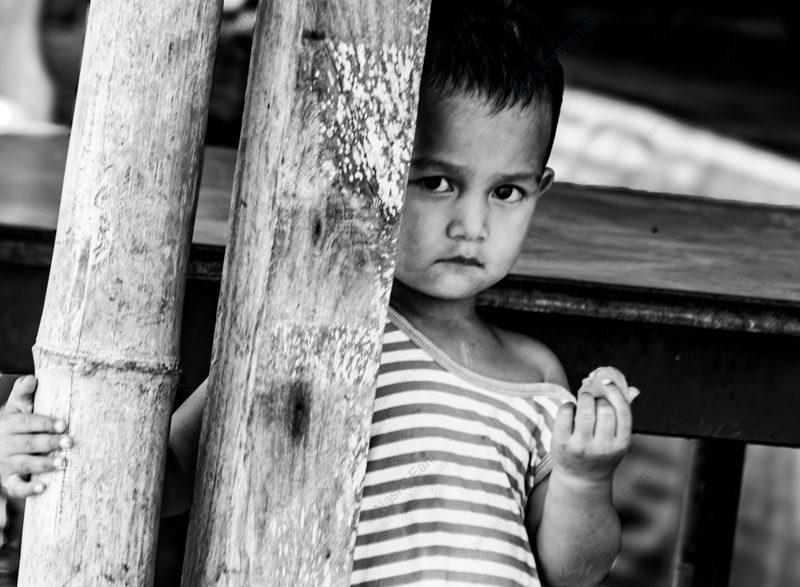 Child Behind the Bamboo Posts - Fine Art Photography Print, Limited Edition Photography, Black and White Photography,  Museum-Quality Print, Art Photography for Collectors